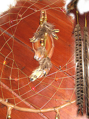 detail of Rabbit and Agate Rust buckskin dreamcatcher