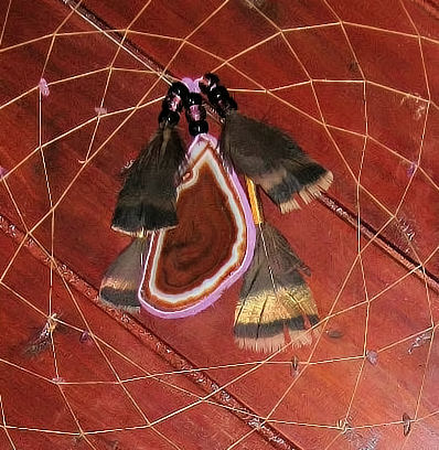 detail of agate slice in dreamcatcher