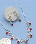 Ruby CZ necklace and earring set.