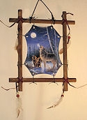 Three wolves howling wall hanging