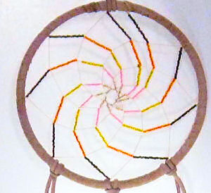 tan or beige spiral seed beaded dream catcher