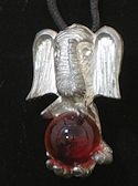 Elephant with red crystal globe pewter pendant