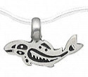 Finely sculpted northwest style whale pewter pendant with chain.
