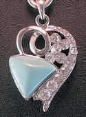 Turquoise and cz swirl heart pendant